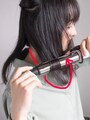 コテを上から挟み逆巻きにする