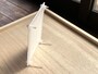 長い方の留め具を下に取り付ける