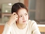 不満そうな女性