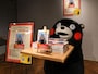 かわいいくまモンの写真がいっぱいだモン＝6月28日、熊本市
