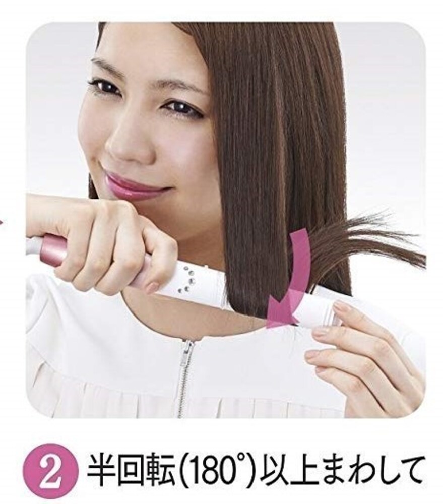 2.耳下の毛束の中間あたりから挟み、半回転ほど巻く(温度は180℃ぐらいが理想)