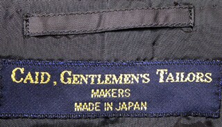 テーラー・ケイドOwn Makeモデル（仮縫い付きのスペシャルオーダー）スーツのタグ