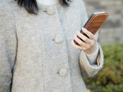 汚れやすいコートの袖口にも汚れ防止で防水スプレー