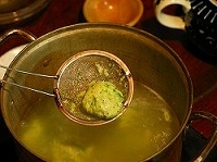 網ですくう